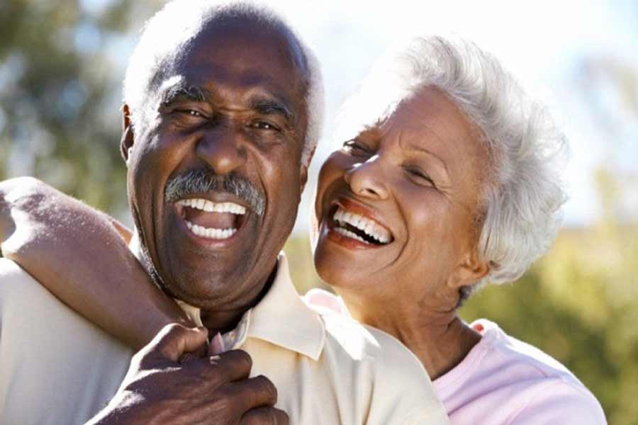 dedicated couple smiling with each other