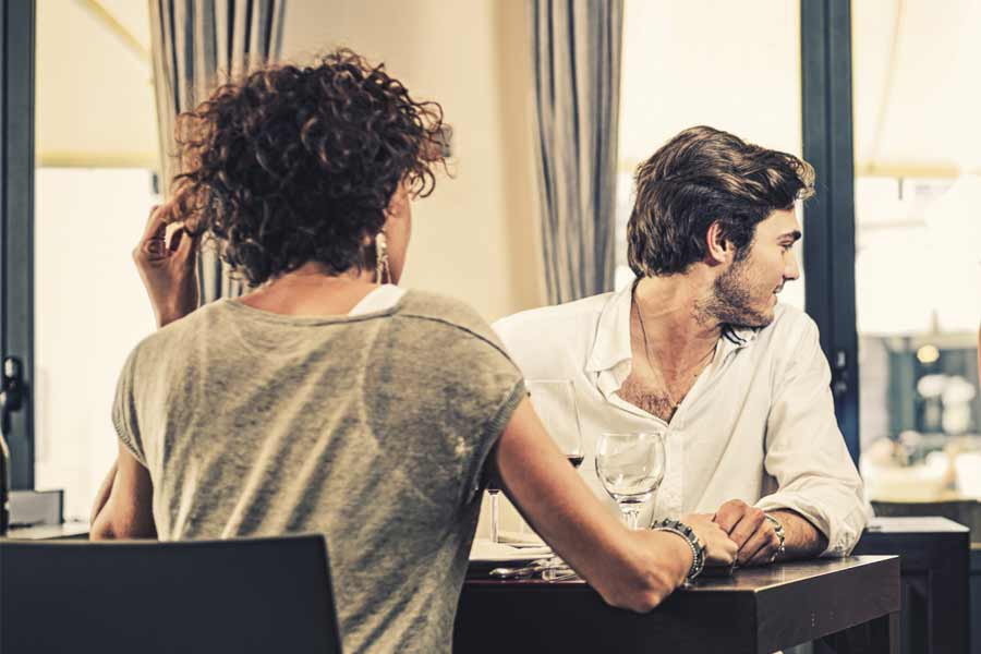 Girl flirting with a man that is not attracted