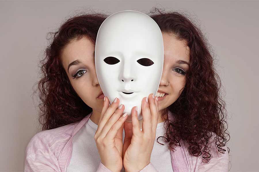 wearing an emotional mask